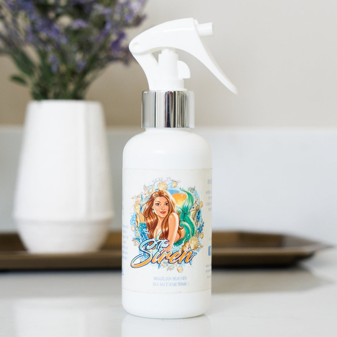 The Siren Sea Salt Hair Tonic texturizing mist for beach waves