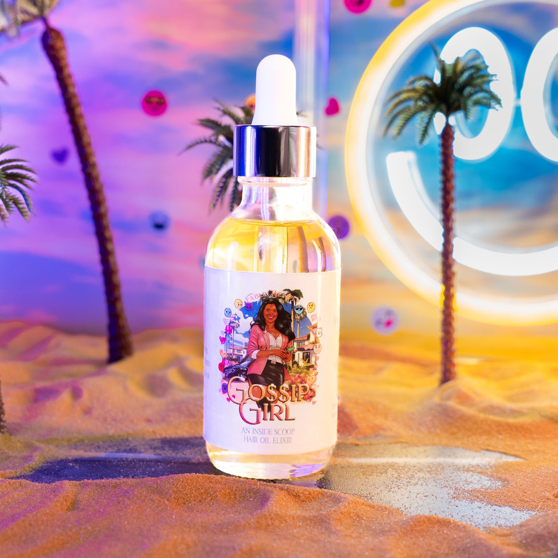 Gossip Girl Hair Oil Elixir bottle in blood orange, coconut sugar and peony scent