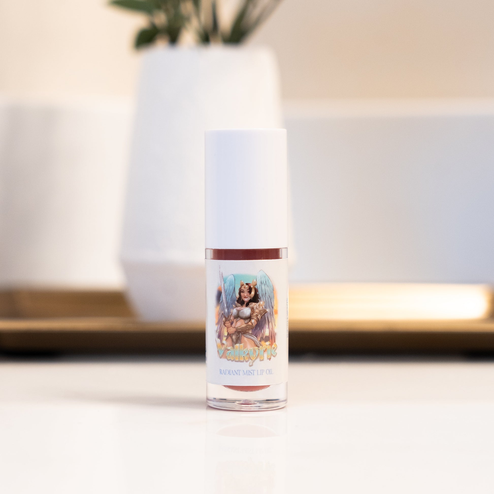 Skincare bottle with decorative label on a neutral background